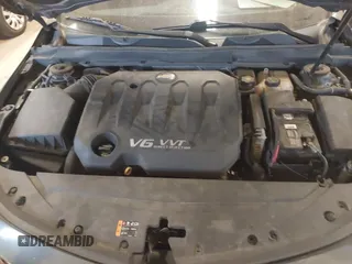 2014 Chevrolet Impala LT with VIN 1G1125S38EU115473, listed as a IAAI auction lot 41851532 with 167,513 mi miles and . Bid and sale history available at DreamBid. Image 10.