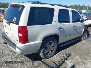 2010 Chevrolet Tahoe LTZ z VIN 1GNUCCE01AR184758, wystawiony jako IAAI lot #41577674 z przebiegiem 245 352 mil mil oraz . Historia ofert i sprzedaży dostępna na DreamBid. Obrazek 4.