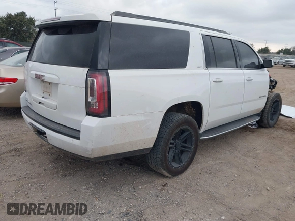 2019 GMC Yukon XL SLT with VIN 1GKS1GKC1KR384332, listed as a IAAI auction lot 41232450 with 109,219 mi miles. Bid and sale history available at carsss.com. Image 4.