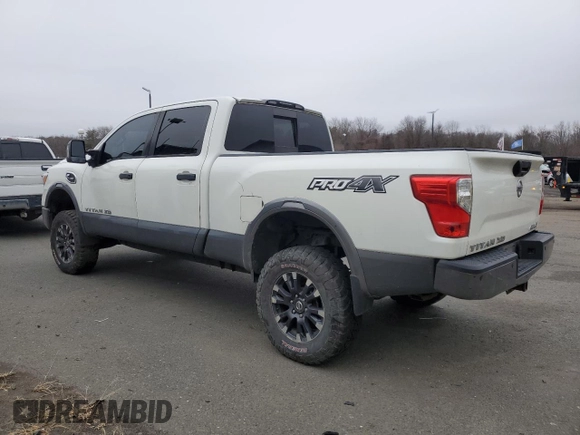 2016 Nissan Titan XD PRO-4X with VIN 1N6BA1F41GN515119, listed as a Copart auction lot 85419494 with 180,435 mi miles and Clean Title. Bid and sale history available at carsss.com. Image 2.