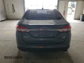 2017 Ford Fusion SE with VIN 3FA6P0HDXHR213441, listed as a Copart auction lot 53442915 with 128,624 mi miles and Salvage title. Bid and sale history available at DreamBid. Image 6.