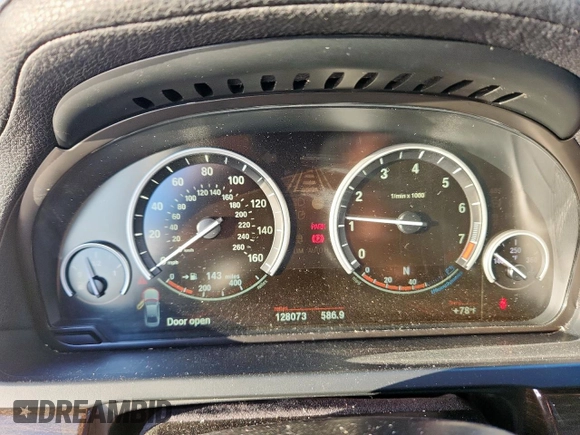 2012 BMW 7 Series 740Li with VIN WBAKB4C59CC576610, listed as a Copart auction lot 62762465 with 128,073 mi miles and Clean title. Bid and sale history available at DreamBid. Image 9.