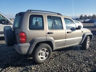 2003 Jeep Liberty Sport with VIN 1J4GL48K53W641210, listed as a Copart auction lot 44279145 with 215,498 mi miles and Clean Title. Bid and sale history available at carsss.com. Image 3.
