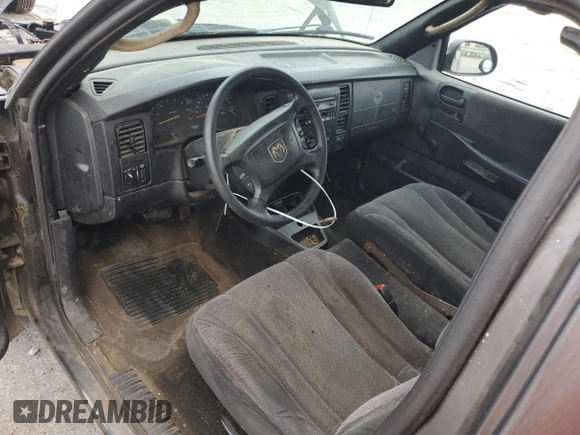 2002 Dodge Dakota с VIN 1B7FL46XX2S511526, выставлен на аукционе Copart как лот 57955594 с пробегом 244 367 миль миль и Списание • Salvage title. История ставок и продаж доступна на DreamBid. Изображение 8.