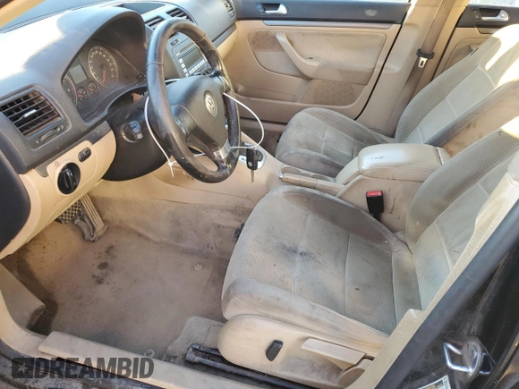 2009 Volkswagen Jetta z VIN 3VWMM31KX9M251901, wystawiony jako Copart lot #84677694 z przebiegiem 299 223 mil mil oraz Szkoda całkowita • Salvage title. Historia ofert i sprzedaży dostępna na DreamBid. Obrazek 7.