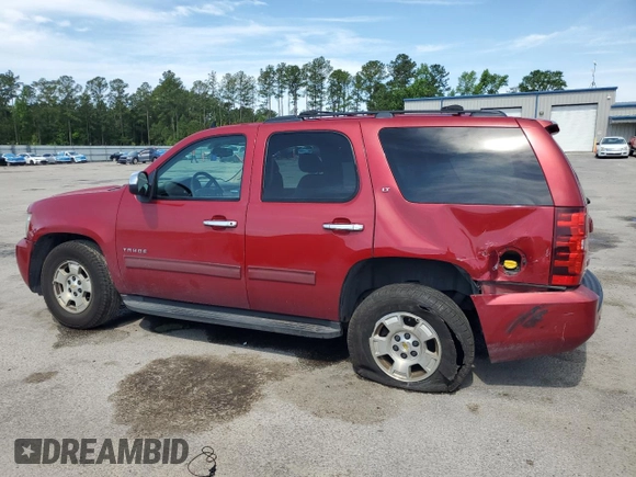 2013 Chevrolet Tahoe LT with VIN 1GNSCBE02DR303732, listed as a Copart auction lot 56175795 with 239,100 mi miles and Salvage title. Bid and sale history available at DreamBid. Image 2.