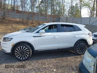 2023 Lincoln Nautilus Black Label z VIN 2LMPJ9JP1PBL28970, wystawiony jako IAAI lot #42091191 z przebiegiem 15 276 mil mil oraz . Historia ofert i sprzedaży dostępna na DreamBid. Obrazek 15.
