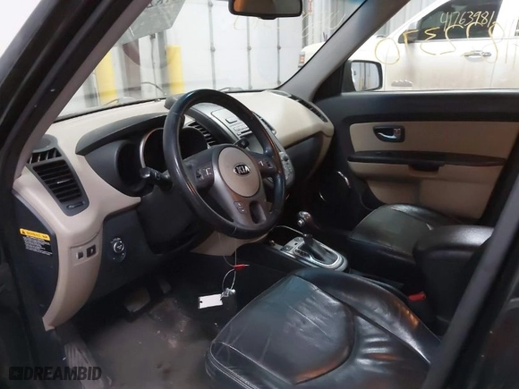 2013 Kia Soul + with VIN KNDJT2A62D7751897, listed as a IAAI auction lot 41822370 with 164,563 mi miles. Bid and sale history available at carsss.com. Image 16.