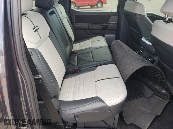 2022 Ford F-150 Lightning Pro z VIN 1FT6W1EV7NWG10601, wystawiony jako Copart lot #55057445 z przebiegiem Nie podano mil oraz Szkoda całkowita • Salvage title. Historia ofert i sprzedaży dostępna na DreamBid. Obrazek 10.