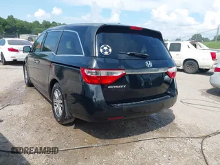 2011 Honda Odyssey EX-L with VIN 5FNRL5H69BB037248, listed as a IAAI auction lot 42613070 with 101,008 mi miles and . Bid and sale history available at DreamBid. Image 3.