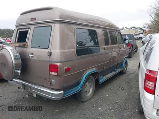 1995 Chevrolet Chevy Van z VIN 1GBEG25K8SF245639, wystawiony jako IAAI lot #41917862 z przebiegiem 89 015 mil mil oraz . Historia ofert i sprzedaży dostępna na DreamBid. Obrazek 4.