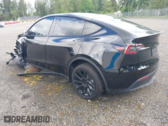 2023 Tesla Model Y Long Range z VIN 7SAYGDEE2PF885116, wystawiony jako IAAI lot #40091902 z przebiegiem 11 779 mil mil oraz . Historia ofert i sprzedaży dostępna na DreamBid. Obrazek 3.