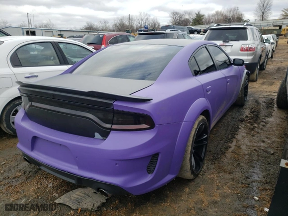 2020 Dodge Charger Scat Pack with VIN 2C3CDXGJ5LH254851, listed as a Copart auction lot 37167262 with 33,065 mi miles and Salvage Title. Bid and sale history available at carsss.com. Image 4.