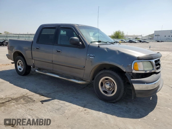 2003 Ford F-150 XLT with VIN 1FTRW07663KA63497, listed as a Copart auction lot 51658115 with 269,633 mi miles and Salvage Title. Bid and sale history available at carsss.com. Image 4.