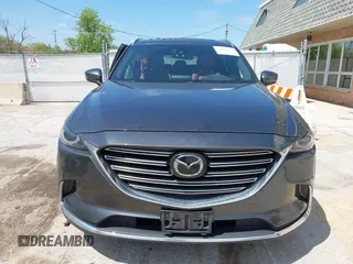 2016 Mazda CX-9 Signature with VIN JM3TCBEY2G0124433, listed as a IAAI auction lot 42194154 with 108,945 mi miles and . Bid and sale history available at DreamBid. Image 12.