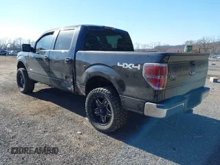 2014 Ford F-150 XL with VIN 1FTFW1ET4EFC16651, listed as a IAAI auction lot 41826158 with 137,544 mi miles. Bid and sale history available at carsss.com. Image 3.