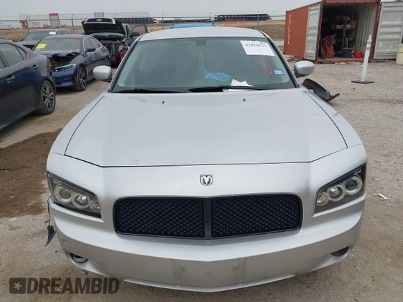 2010 Dodge Charger SXT with VIN 2B3CA3CV0AH237203, listed as a IAAI auction lot 42058517 with 257,514 mi miles and . Bid and sale history available at DreamBid. Image 12.