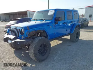 2016 Jeep Wrangler Unlimited 75th Anniversary with VIN 1C4BJWEG7GL179001, listed as a IAAI auction lot 42030735 with 123,681 mi miles. Bid and sale history available at carsss.com. Image 6.