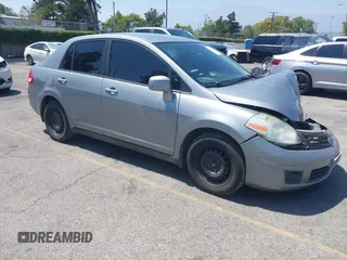 2010 Nissan Versa S with VIN 3N1BC1AP2AL406399, listed as a IAAI auction lot 42510031 with Not provided miles and . Bid and sale history available at DreamBid. Image 1.