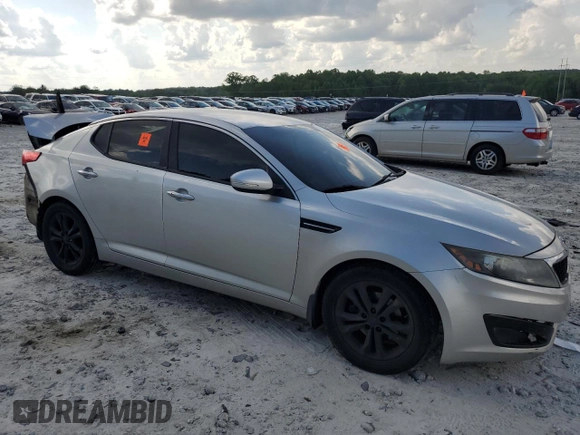 2012 Kia Optima EX z VIN 5XXGN4A75CG083916, wystawiony jako Copart lot #54954205 z przebiegiem 253 854 mil mil oraz Szkoda całkowita • Salvage title. Historia ofert i sprzedaży dostępna na DreamBid. Obrazek 4.
