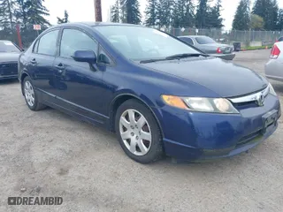 2008 Honda Civic Sdn LX with VIN 1HGFA16528L116411, listed as a IAAI auction lot 42017196 with 124,124 mi miles. Bid and sale history available at carsss.com. Image 6.