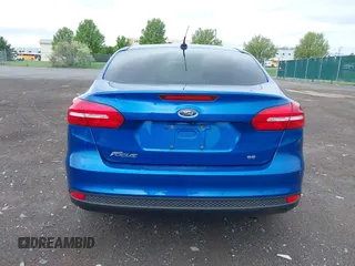 2018 Ford Focus SE z VIN 1FADP3F29JL235302, wystawiony jako IAAI lot #42262964 z przebiegiem 85 127 mil mil oraz . Historia ofert i sprzedaży dostępna na DreamBid. Obrazek 16.