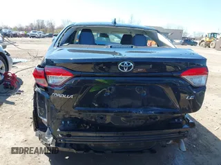 2021 Toyota Corolla LE with VIN 5YFEPMAEXMP161048, listed as a IAAI auction lot 42041751 with 30,650 mi miles and . Bid and sale history available at DreamBid. Image 6.