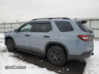 2025 Honda Pilot TrailSport with VIN 5FNYG1H69SB003433, listed as a Copart auction lot 44587005 with 16,854 mi miles and Salvage Title. Bid and sale history available at carsss.com. Image 2.