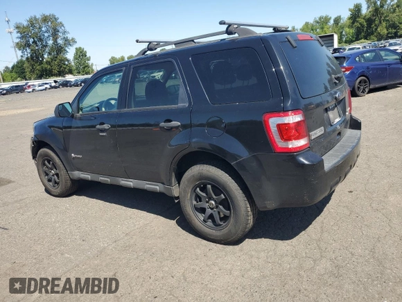 2010 Ford Escape Hybrid with VIN 1FMCU4K38AKC98072, listed as a Copart auction lot 58192375 with 123,958 mi miles and Salvage title. Bid and sale history available at DreamBid. Image 2.