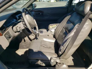 1999 Cadillac Eldorado z VIN 1G6EL12Y0XU604529, wystawiony jako Copart lot #77620004 z przebiegiem 246 032 mil mil oraz Szkoda całkowita • Salvage title. Historia ofert i sprzedaży dostępna na DreamBid. Obrazek 7.