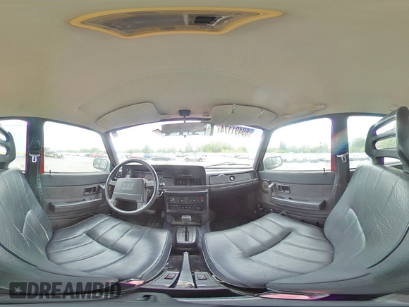 1993 Volvo 240 with VIN YV1AW8801P1942014, listed as a Copart auction lot 69491174 with 145,809 mi miles and Salvage title. Bid and sale history available at DreamBid. Image 13.