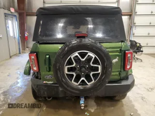 2022 Ford Bronco z VIN 1FMDE5DH1NLB59322, wystawiony jako Copart lot #57809495 z przebiegiem 64 094 mil mil oraz Szkoda całkowita • Salvage title. Historia ofert i sprzedaży dostępna na DreamBid. Obrazek 6.
