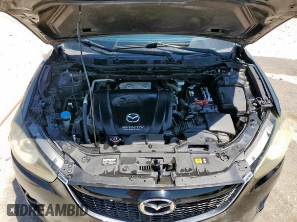 2014 Mazda CX-5 Touring with VIN JM3KE2CY5E0316077, listed as a Copart auction lot 58218735 with 190,789 mi miles and Salvage title. Bid and sale history available at DreamBid. Image 12.