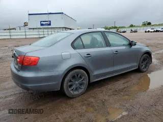 2012 Volkswagen Jetta SE z VIN 3VWDX7AJ7CM124472, wystawiony jako Copart lot #58871595 z przebiegiem 143 563 mil mil oraz Czysty tytuł • Clean title. Historia ofert i sprzedaży dostępna na DreamBid. Obrazek 3.