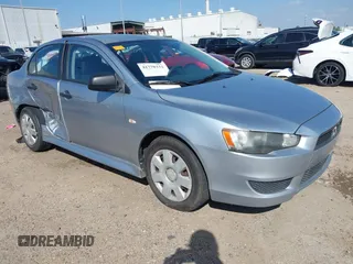 2010 Mitsubishi Lancer DE with VIN JA32U1FU4AU015574, listed as a IAAI auction lot 41770332 with 125,458 mi miles. Bid and sale history available at carsss.com. Image 1.