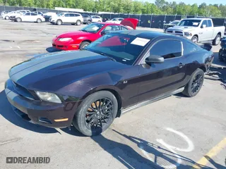 2012 Ford Mustang V6 Premium with VIN 1ZVBP8AMXC5210873, listed as a IAAI auction lot 41944669 with 213,555 mi miles. Bid and sale history available at carsss.com. Image 18.