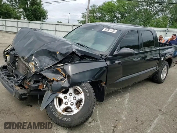2006 Dodge Dakota SLT z VIN 1D7HW48N56S641575, wystawiony jako Copart lot #60141125 z przebiegiem 135 482 mil mil oraz Szkoda całkowita • Salvage title. Historia ofert i sprzedaży dostępna na DreamBid. Obrazek 13.