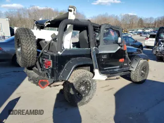 2004 Jeep Wrangler Rubicon with VIN 1J4FA69S74P785297, listed as a Copart auction lot 47332944 with 61,323 mi miles and Salvage Title. Bid and sale history available at carsss.com. Image 3.