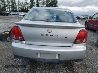 2000 Toyota ECHO with VIN JTDAT1239Y0040310, listed as a Copart auction lot 69115394 with 103,347 mi miles and Salvage Title. Bid and sale history available at DreamBid. Image 6.
