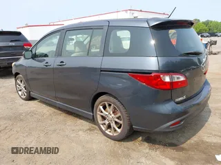 2012 Mazda 5 Touring z VIN JM1CW2CL5C0126744, wystawiony jako IAAI lot #42385667 z przebiegiem 140 150 mil mil oraz . Historia ofert i sprzedaży dostępna na DreamBid. Obrazek 3.