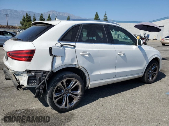 2015 Audi Q3 Premium Plus with VIN WA1BFCFS0FR001987, listed as a Copart auction lot 72962684 with 104,432 mi miles and Salvage title. Bid and sale history available at DreamBid. Image 3.