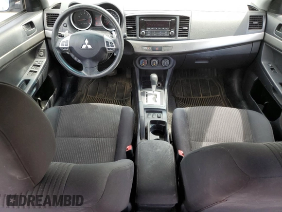 2014 Mitsubishi Lancer SE z VIN JA32V2FW3EU602908, wystawiony jako Copart lot #60148705 z przebiegiem 188 938 mil mil oraz Szkoda całkowita • Salvage title. Historia ofert i sprzedaży dostępna na DreamBid. Obrazek 8.