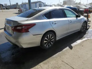 2018 Nissan Altima SV with VIN 1N4AL3AP8JC207041, listed as a Copart auction lot 51521575 with 127,482 mi miles and Salvage Title. Bid and sale history available at DreamBid. Image 3.