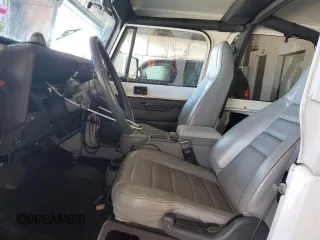 1995 Jeep Wrangler with VIN 1J4FY29S8SP272660, listed as a Copart auction lot 88342595 with 106,805 mi miles and Salvage Title. Bid and sale history available at carsss.com. Image 7.
