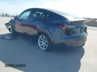2024 Tesla Model Y with VIN 7SAYGDED9RF044789, listed as a IAAI auction lot 41817318 with Not Provided miles and . Bid and sale history available at carsss.com. Image 3.