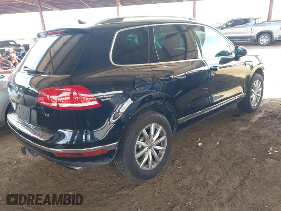 2016 Volkswagen Touareg Sport with VIN WVGEF9BP0GD012148, listed as a IAAI auction lot 42195030 with 95,984 mi miles and . Bid and sale history available at DreamBid. Image 4.