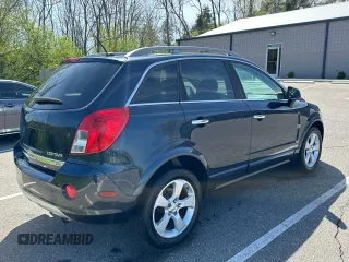 2014 Chevrolet Captiva Sport LTZ with VIN 3GNAL4EK7ES543592, listed as a Copart auction lot 54511805 with 122,217 mi miles and Clean Title. Bid and sale history available at carsss.com. Image 4.