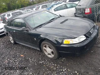 2002 Ford Mustang Standard with VIN 1FAFP404X2F211017, listed as a IAAI auction lot 42210520 with Not provided miles and . Bid and sale history available at DreamBid. Image 1.