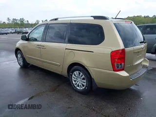 2011 Kia Sedona LX with VIN KNDMG4C71B6407306, listed as a IAAI auction lot 41922697 with 243,248 mi miles. Bid and sale history available at carsss.com. Image 3.