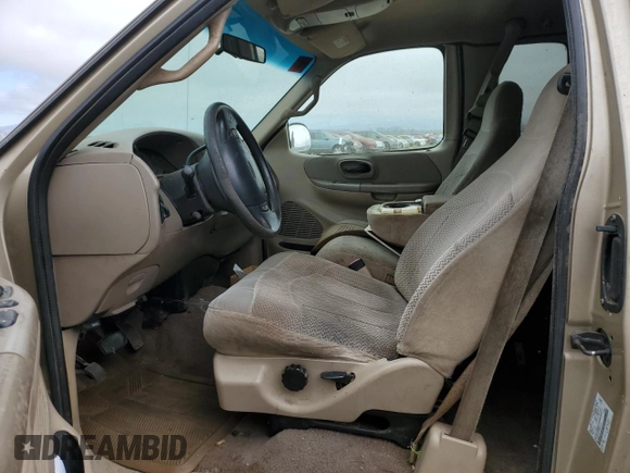 2000 Ford F-150 XL with VIN 1FTRX17L3YKB07018, listed as a Copart auction lot 66998714 with 0 mi miles and Salvage Title. Bid and sale history available at carsss.com. Image 7.